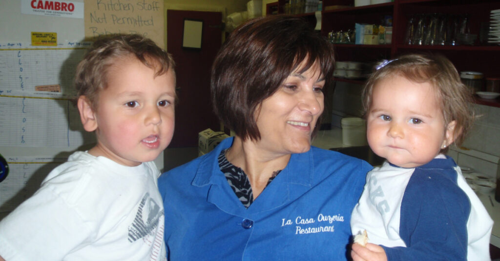 Jackie Portalaki with her grandchildren in the early days of La Casa Ouzeria